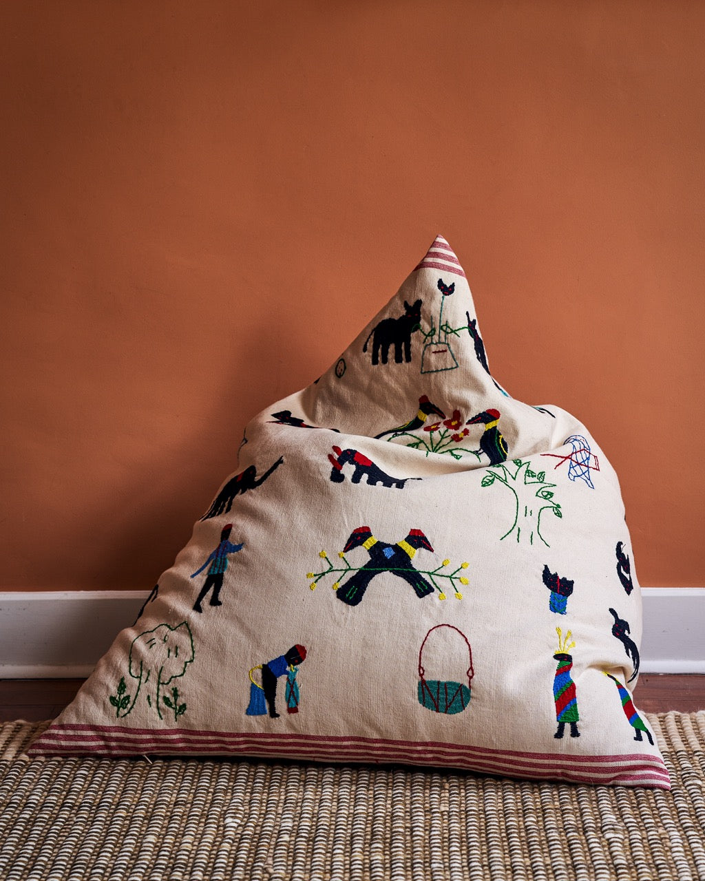 Kids Naga bean bag with blue accents, side view