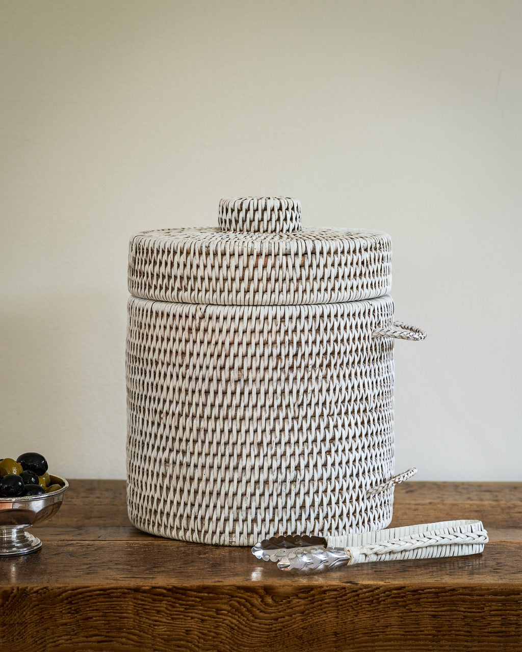 Strand rattan ice bucket in white, side view